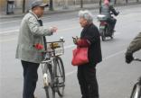 china-elderly street scene bike